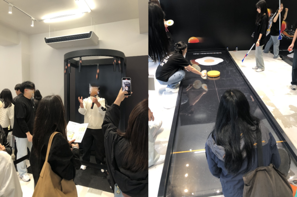 (좌) 떨어지는 막대기를 잡는 게임 '순발력의 한계란'과 (우) 계란프라이 노른자 위에 볼을 밀어넣는 컬링 게임 '완벽의 한계란' /사진=김현정 기자